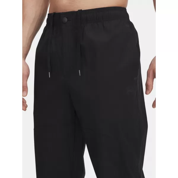 Sporthose für Herren UNDER ARMOUR UA UNSTPBLE WOVEN TX TAPER 6003865-001 SCHWARZ 