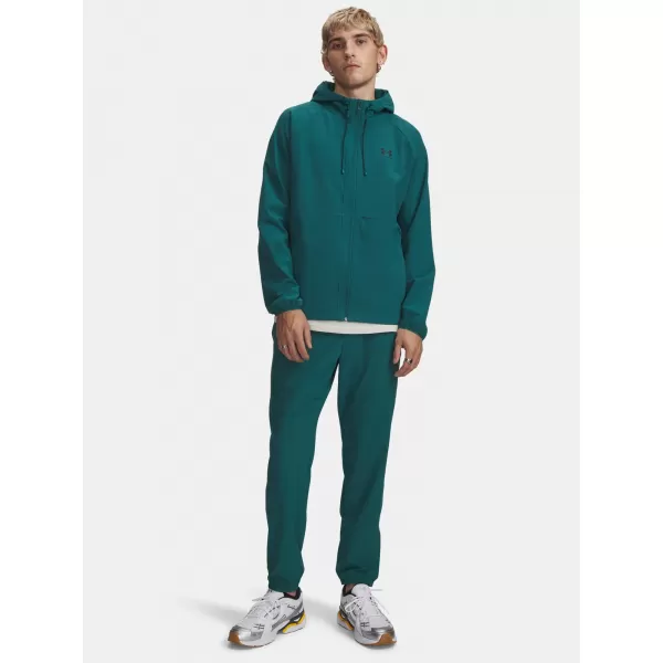  Herren-Jogginghose UNDER ARMOUR VIBE WOVEN JOGGER 1386557-338 GRÜN 