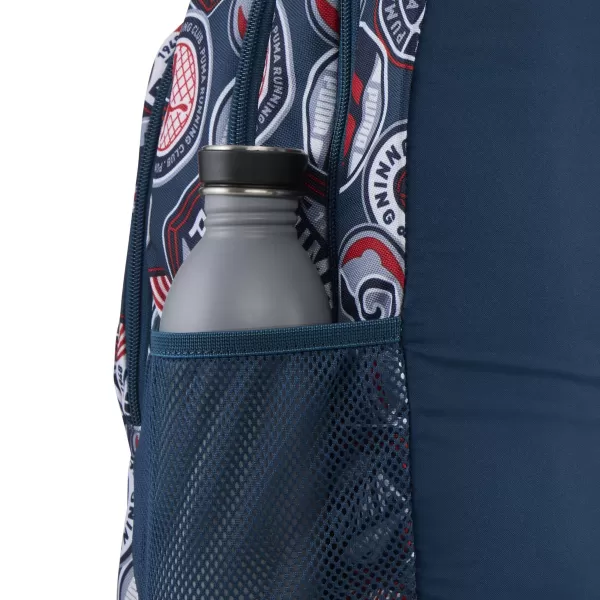  Rucksack PUMA ACADEMY AOP BACKPACK 09115027 MITTERNACHTSBENZIN/FÜR ALLE ZEITEN ROT/LAUFABZEICHEN AOP 