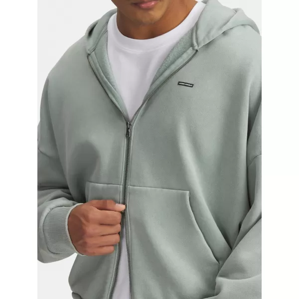  Herren-Sweatshirt UNDER ARMOUR ICON HWT FLEECE WASH FZ 6000651-348 GRÜN 